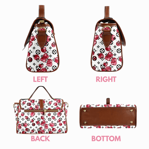 Goldene Handtasche aus floralem Leder