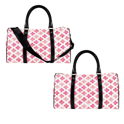 Goldene Handtasche aus floralem Leder