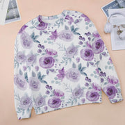 Floral patterned shirt with purple flowers on a beige surface