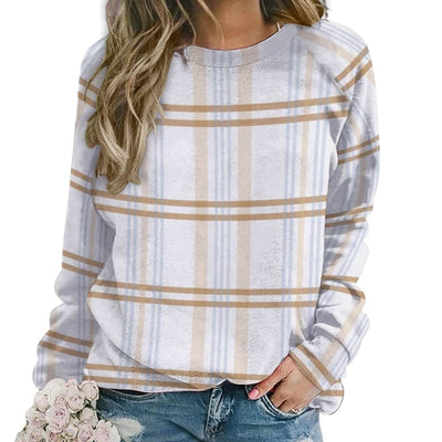 Woman wearing a plaid shirt with a white background