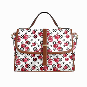 Goldene Handtasche aus floralem Leder