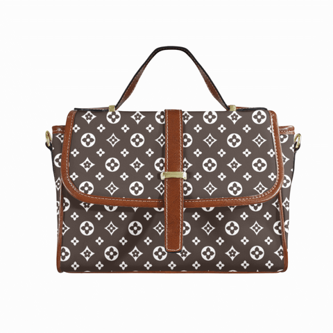 Goldene Handtasche aus floralem Leder